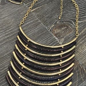 Contemporary metal statement necklace and earrings